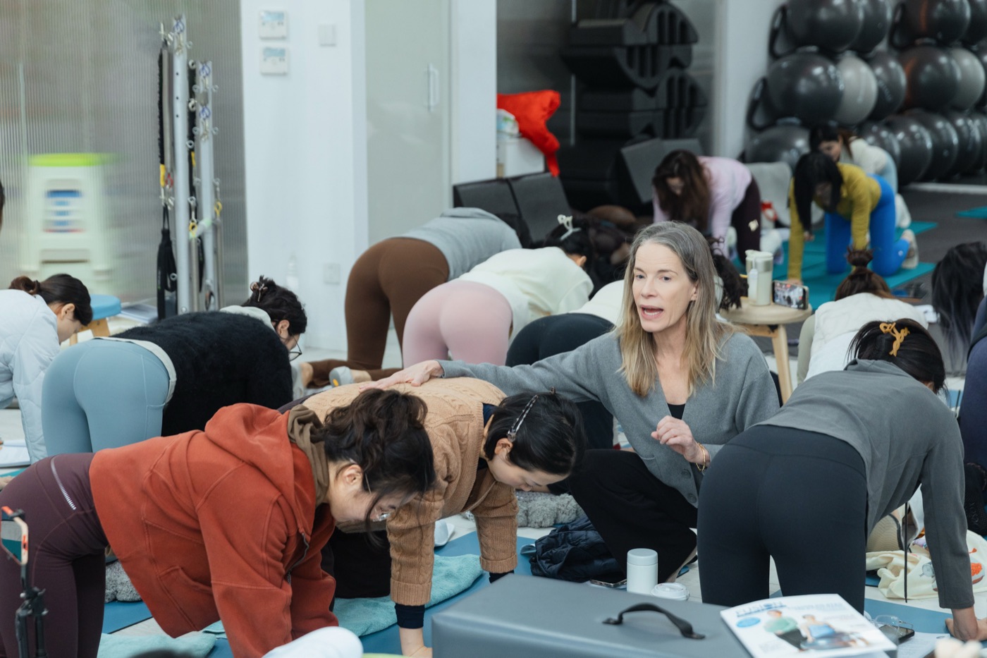 Jennifer Gianni teaching a Pilates class
